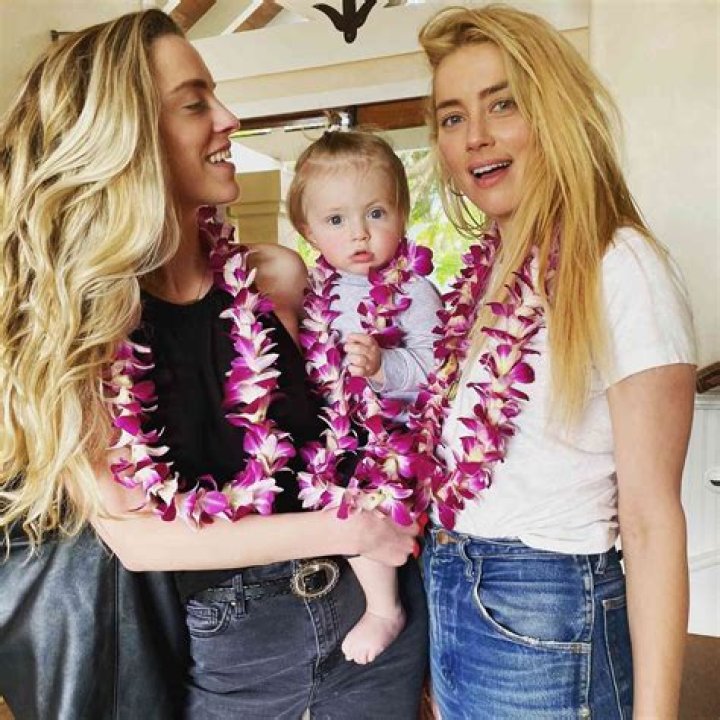 How much does Amber Heard's sister make?