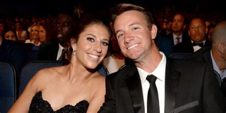 Why did Carli Lloyd wear her husband's name?